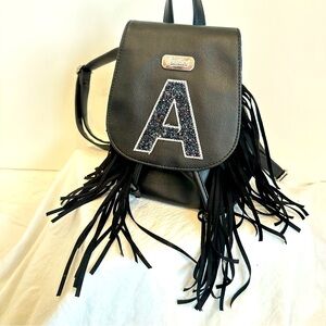 Justice backpack small letter A